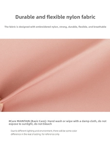 Close-up of pink embroidered nylon fabric showing flexible, durable, and breathable texture
