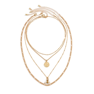 Detail of a four-layer gold-toned necklace set with coin pendant and faux pearl charms
