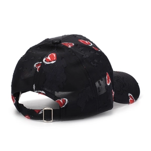 Distressed black baseball cap with red and white heart print and adjustable metal buckle
