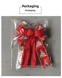 Retail packaging showing a red satin double-layered Christmas bow with gold trim