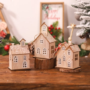 Three-piece set of lighted Christmas wooden houses with snow roofs and hanging strings