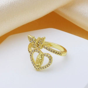 Gold open ring featuring a butterfly and hollow heart with portrait and crystals