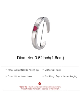 Detailed size specifications of the adjustable silver alloy ring with pink heart charm