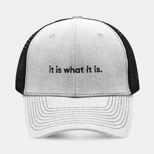 Gray and black mesh baseball cap featuring embroidered It is what it is text on the front