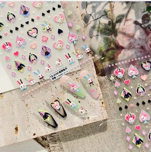 Detail of 3D embossed rabbit and card nail art stickers TS-4134 on pastel tips