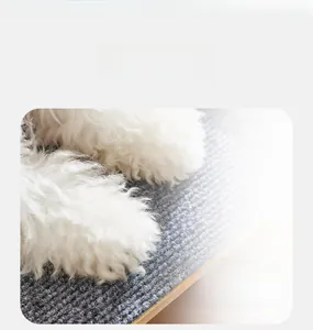 Detail of grey anti-slip carpet texture on a wooden pet ramp for dogs and cats