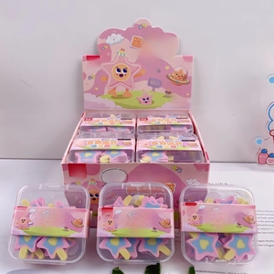 Close-up of pink star-shaped erasers in clear individual boxes and bulk display packaging