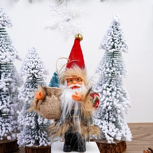 Detail of Santa plush doll with metal glasses and bells set in a snowy Christmas scene