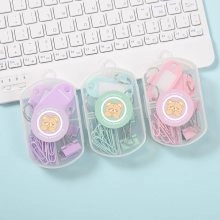 Close-up of macaron color stationery sets with paper clips and binder clips in boxes