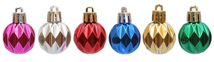 Row of six colorful multi-faceted Christmas ball ornaments with metallic finish