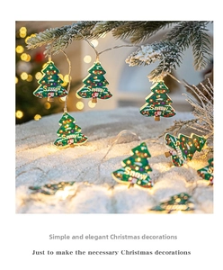 Detailed view of LED Christmas tree light strings with Snow lettering and Santa patterns