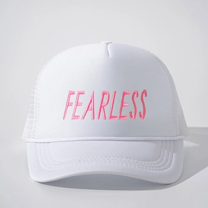 White trucker hat with pink Fearless embroidery and breathable mesh back for outdoors