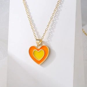 18K gold plated necklace featuring a dual-layer orange and yellow enamel heart pendant