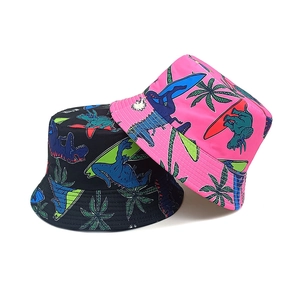 Detail showing cartoon dinosaur and palm tree patterns on colorful bucket hats