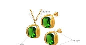 Detail of emerald crystal jewelry set with necklace dimensions and golden earrings