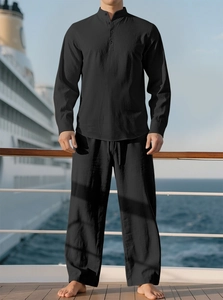 Detail of black cotton linen casual set showing the texture of long sleeve shirt and pants