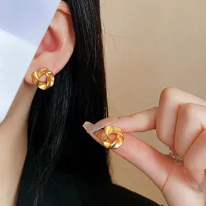 Minimalist matte gold geometric twisted earrings in a stylish Mobius loop design for women
