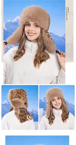 Close-up of fluffy leopard print trapper hat with thick plush ear flaps for winter wear