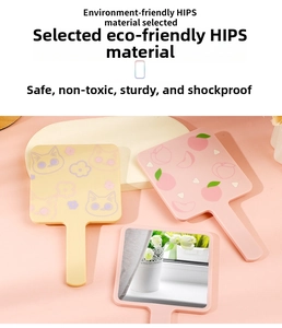 Close-up of eco-friendly HIPS material cat and peach patterned handheld makeup mirrors