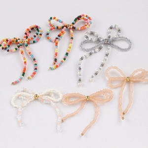 Handmade beaded bow tie accessories with colorful seed beads and pearls in six styles