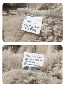 Detail view of heavy fleece hoodie neck lining and fabric care label for size L