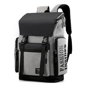 Detail view of the gray and black backpack featuring FASHION INSIDER text print