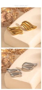 Polished wave-shaped stainless steel earrings in gold and silver finish on stone pedestals