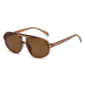 Fashionable oversized pilot sunglasses with brown translucent frames and tinted lenses