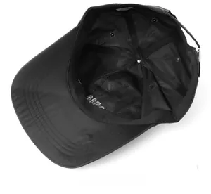 Internal view of black baseball cap showing reinforced seams and breathable sweatband