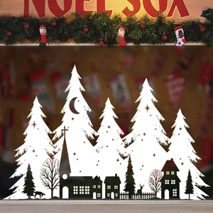 White Christmas window decals featuring snow trees, reindeer and a winter village scene
