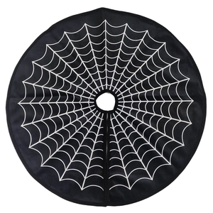 Halloween tree skirt with white spider web pattern on black fabric background