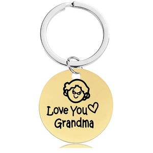 Polished gold round keychain engraved with Love You Grandma text and grandmother icon