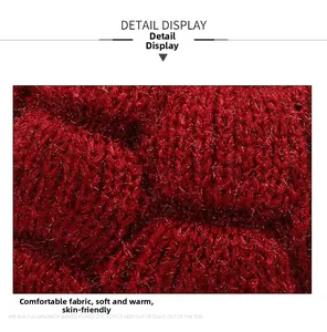 Macro shot of thick red knit fabric with metallic luster and warm fleece texture