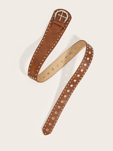 Detail view of a brown leather punk belt with silver rivets and metal grommet accents