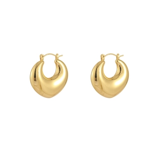 Macro shot of 18K gold plated hollow U-shape teardrop earrings with a polished metallic finish
