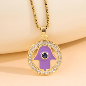 Gold Hamsa Hand necklace with purple enamel, blue devil eye, and sparkling zircon halo