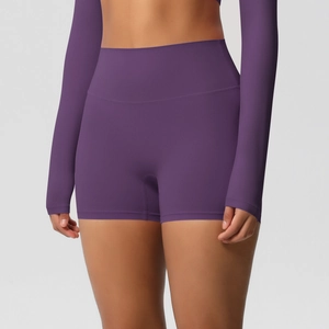 Detail of high-waist fitness shorts in deep purple showing squat-proof stretchy fabric