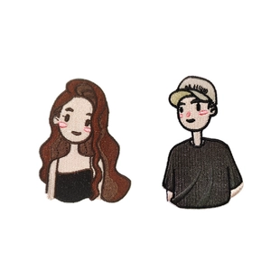 Cartoon couple embroidery patches featuring a girl and a boy for DIY clothing decor
