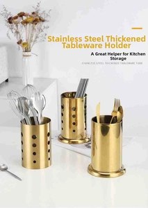 Close-up of golden stainless steel cutlery holders with drainage holes for kitchen utensils