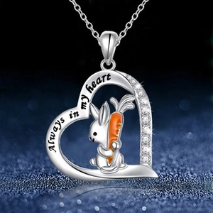 Detail of silver heart necklace with rabbit carrot pendant and Always in my heart engraving