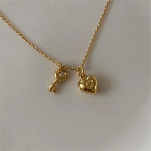 925 sterling silver gold-plated O-chain necklace featuring heart and key pendant charms