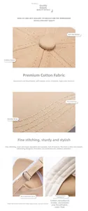 Detailed macro view of khaki cotton baseball cap with adjustable metal buckle and stitching