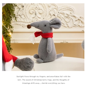 Detailed view of handmade gray felt Christmas mouse with red knitted scarf for decor