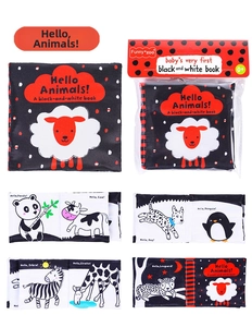 Macro detail of high-contrast black and white animal cloth books for infant visual development