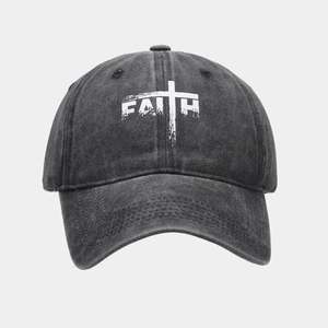 Detailed front view of vintage washed cotton baseball cap featuring Faith cross print