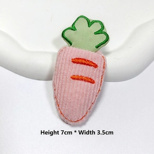 Detail of pink corduroy carrot embroidery patch with green leaf top, size 7cm x 3.5cm