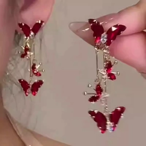 Elegant long tassel earrings with red butterfly crystals and silver needle studs