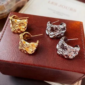 Chic irregular crumpled C-shaped hoop earrings in gold and silver metallic finishes
