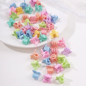 Colorful butterfly mini hair claws in assorted pastel candy colors for girls