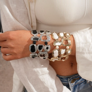 Bohemian irregular geometric cuff bracelet with vintage textured metal and enamel inlay